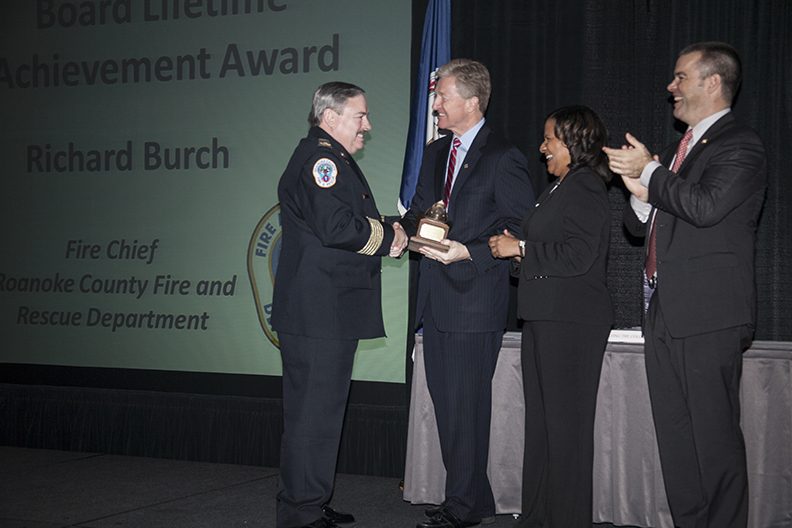 Chief Richard. E. Burch, Jr. accepts Governor's Award